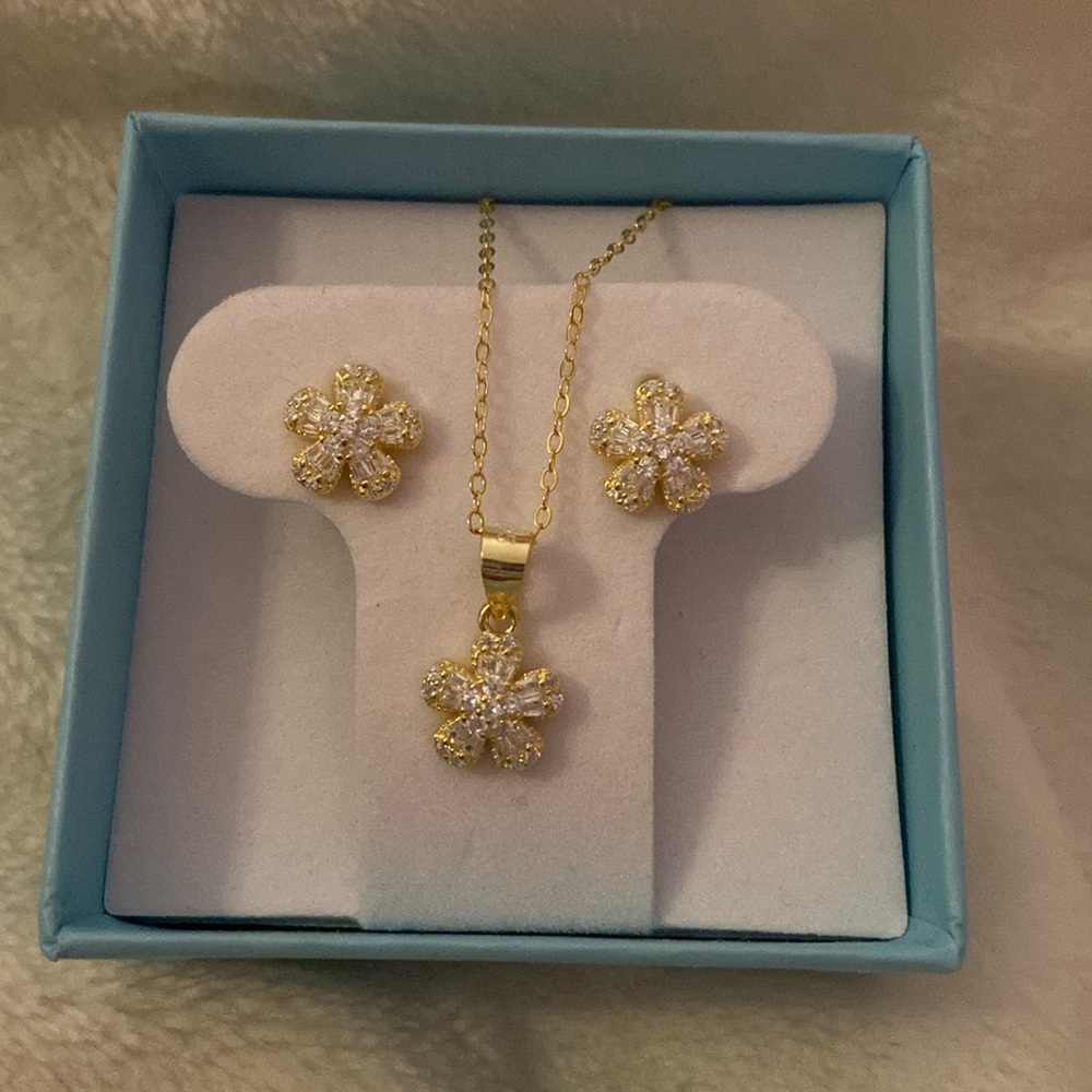 gold flower cubic zirconia earrings and necklace